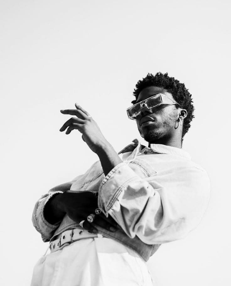 Model wearing Teenage Menswear denim jacket and sunglasses